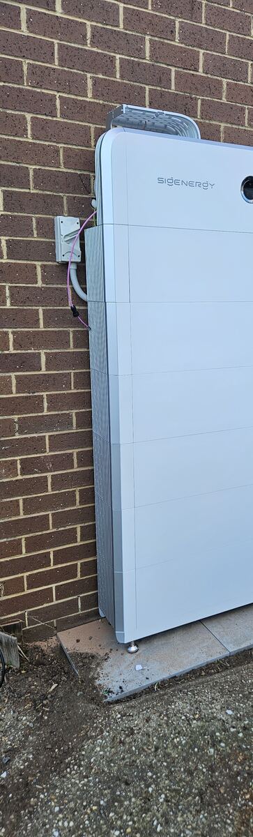 Sigenergy home battery installed against a brick wall