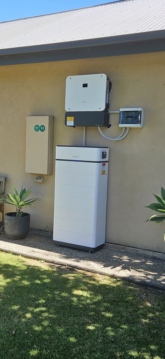 Sungrow inverter and battery stack mounted on an exterior wall