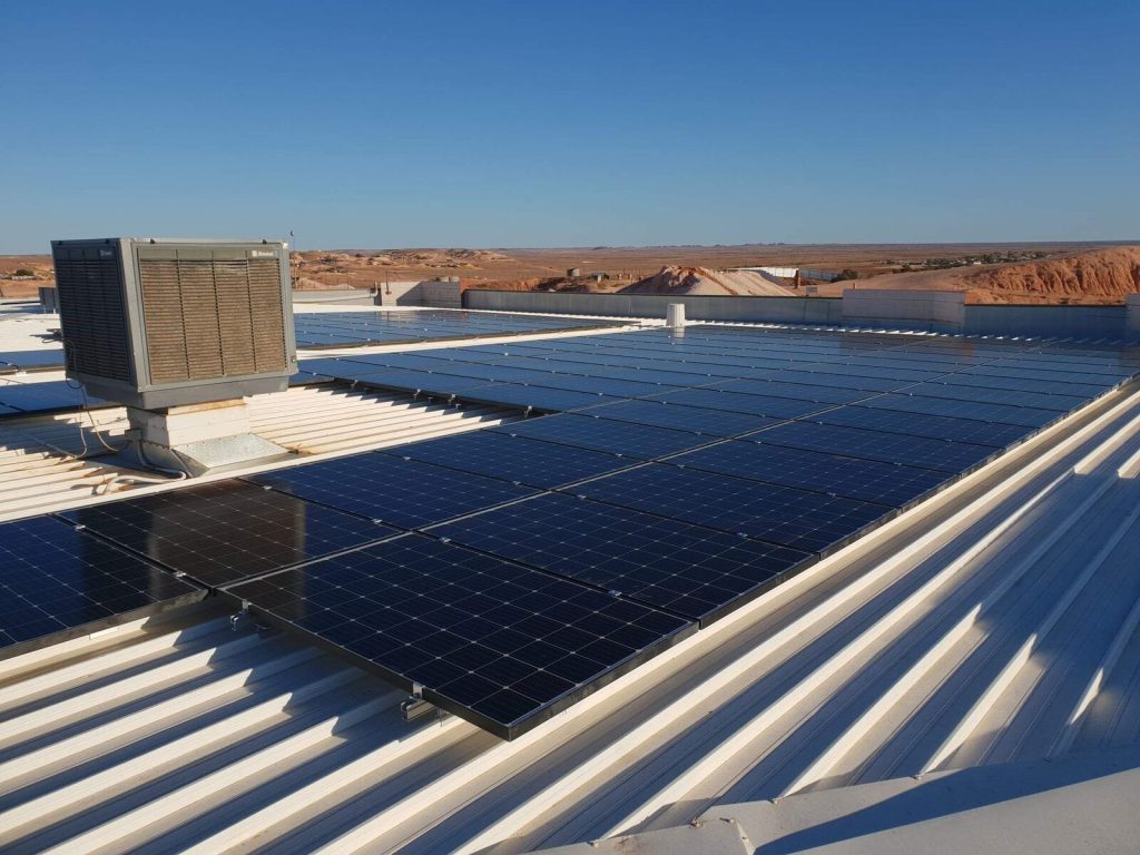 Rooftop solar array on a commercial building in an outback town