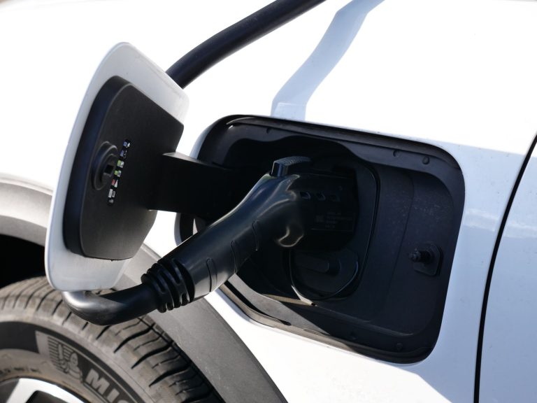Charging cable plugged into an electric vehicle charge port